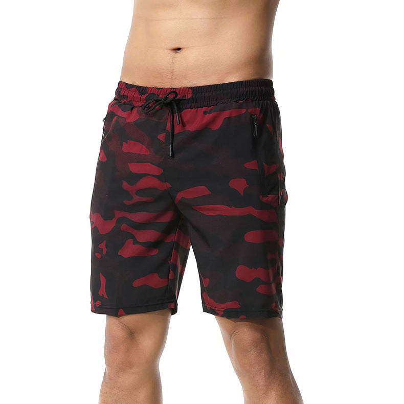 A man wearing red camou color ATHX CamoQuick Run Shorts a product from mensathletix the best Men athletic shorts Gym shorts Mens running shorts Crossfit shorts Sports shorts sports shorts for Men gym shorts