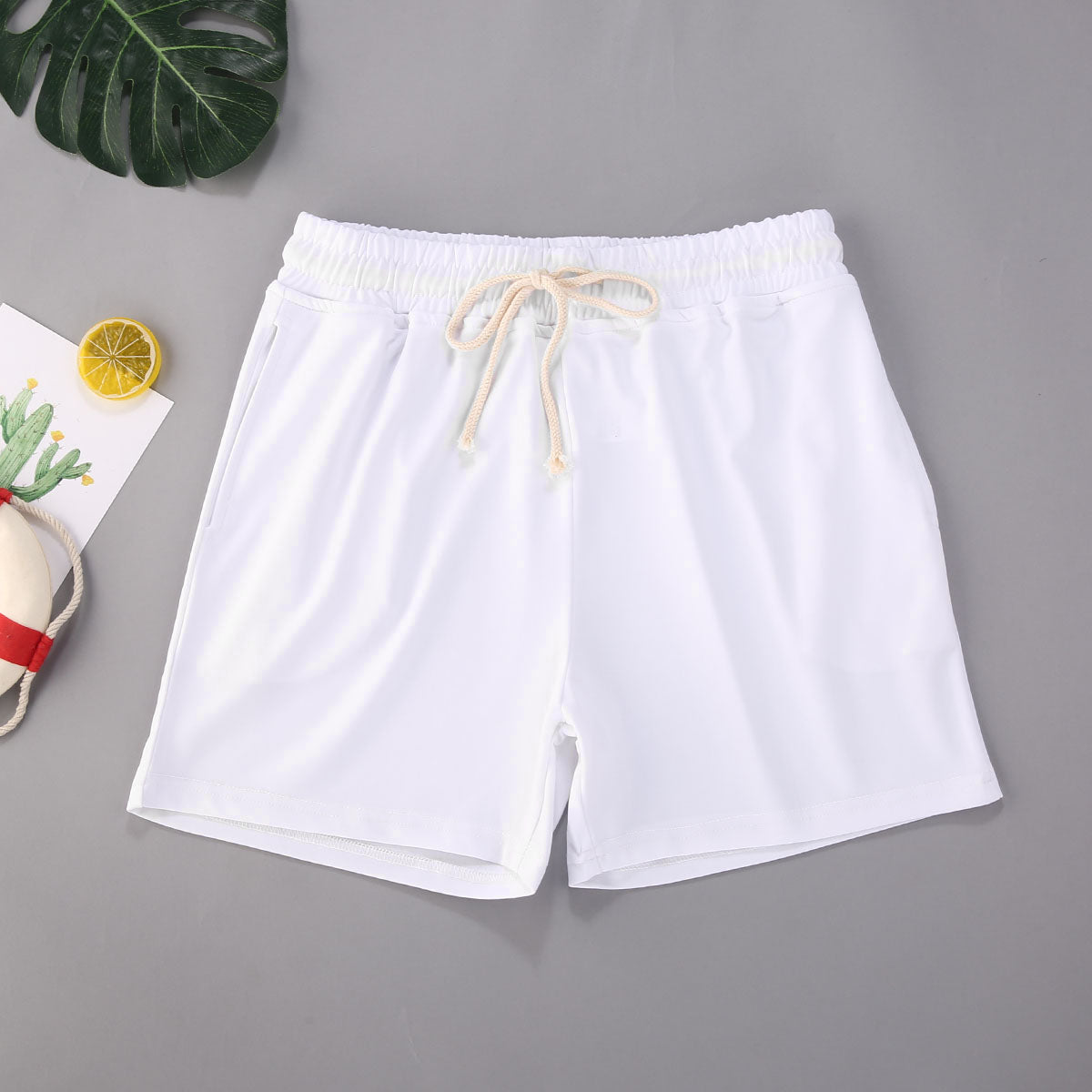 A white color Beach Style Men's Swimming Shorts Solid Color Shorts Men a product from mensathletix the best Men athletic shorts Gym shorts Mens running shorts Crossfit shorts Sports shorts sports shorts for men gym shorts