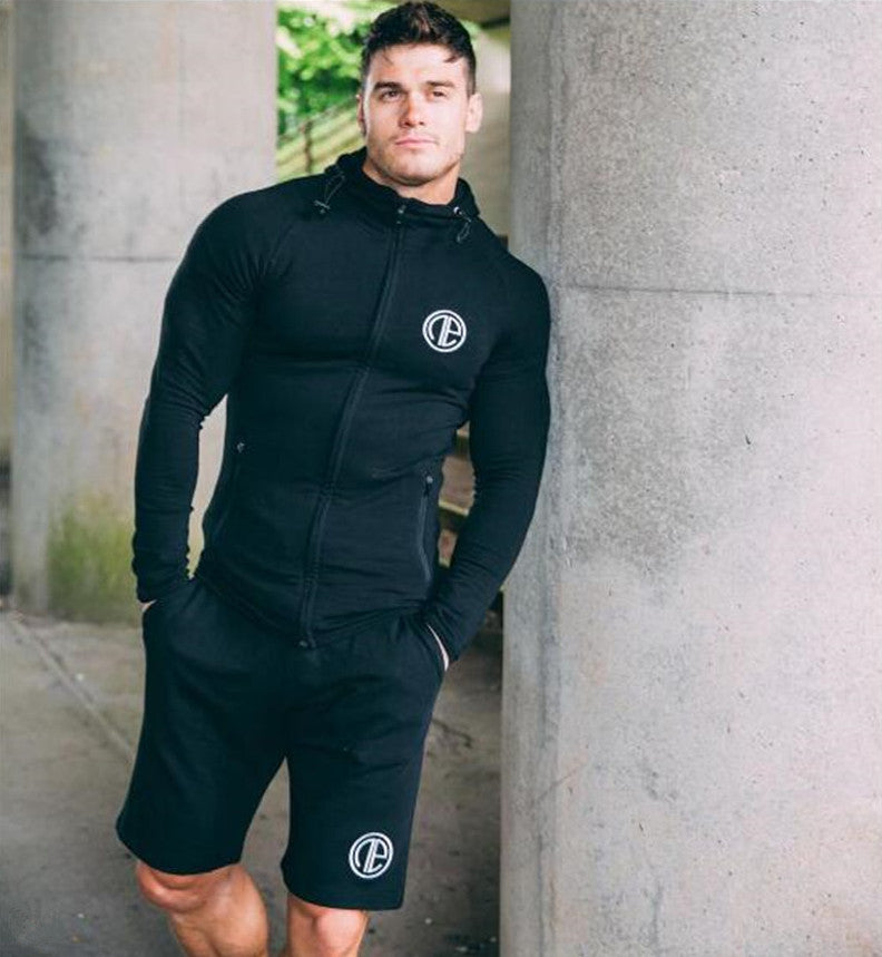 A man wearing black color Casual men's shorts outdoor fitness pants a product from mensathletix the best Men athletic shorts Gym shorts Mens running shorts Crossfit shorts Sports shorts sports shorts for men gym shorts