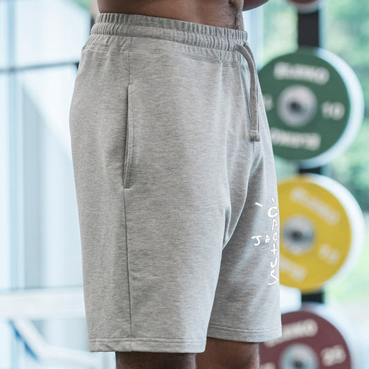 A man wearing ash color Casual Breathable Sports Fitness Men's Shorts a product from mensathletix the best Men athletic shorts Gym shorts Mens running shorts Crossfit shorts Sports shorts sports shorts for men  gym shorts