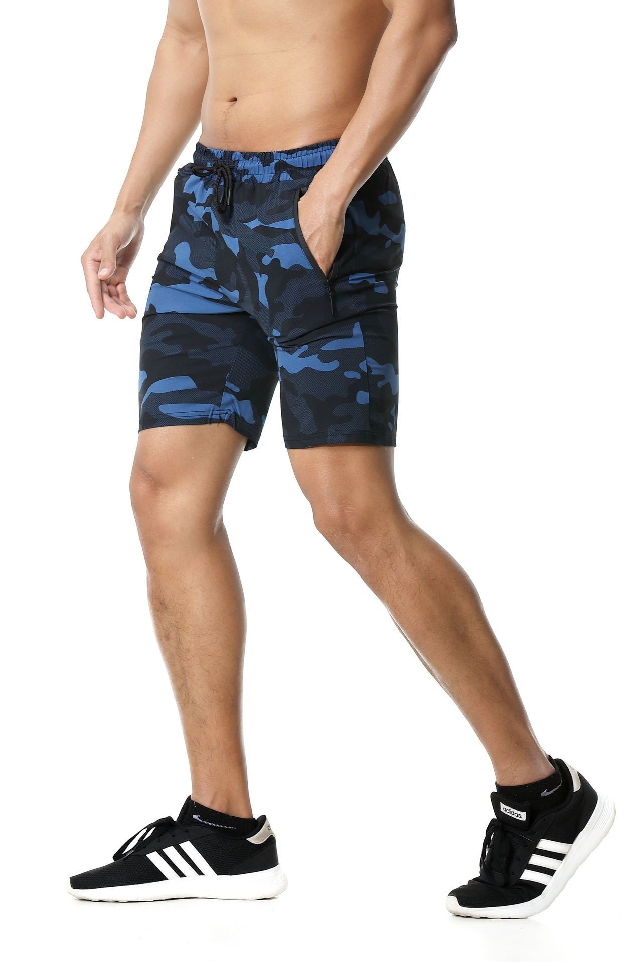 A man wearing blue camou color ATHX CamoQuick Run Shorts a product from mensathletix the best Men athletic shorts Gym shorts Mens running shorts Crossfit shorts Sports shorts sports shorts for Men gym shorts