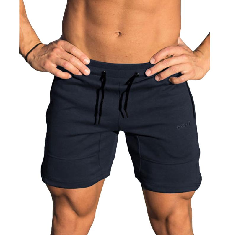 A man wearing navy blue color Casual Drawstring Shorts a product from mensathletix the best Men athletic shorts Gym shorts Mens running shorts Crossfit shorts Sports shorts sports shorts for men gym shorts