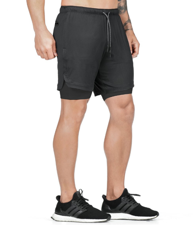 A man wearing black color ATHX DualSport Fitness Shorts a product from mensathletix the best Men athletic shorts Gym shorts Mens running shorts Crossfit shorts Sports shorts sports shorts for Men gym shorts