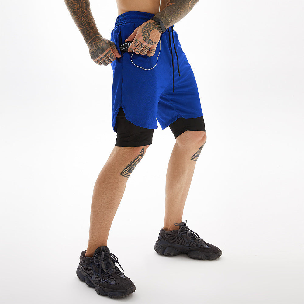 A man wearing blue colorATHX CottonFit 5-Point Shorts a product from mensathletix the best Men athletic shorts Gym shorts Mens running shorts Crossfit shorts Sports shorts sports shorts for Men gym shorts