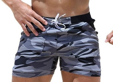 A man wearing camou color ATHX BeachCam Swim Shorts   a product from mensathletix the best Men athletic shorts Gym shorts Mens running shorts Crossfit shorts Sports shorts sports shorts for men gym shorts