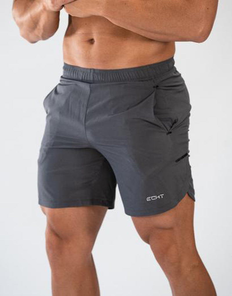 A man wearing ash color Casual fashion fitness quick-dry exercise training shorts a product from mensathletix the best Men athletic shorts Gym shorts Mens running shorts Crossfit shorts Sports shorts sports shorts for men gym shorts