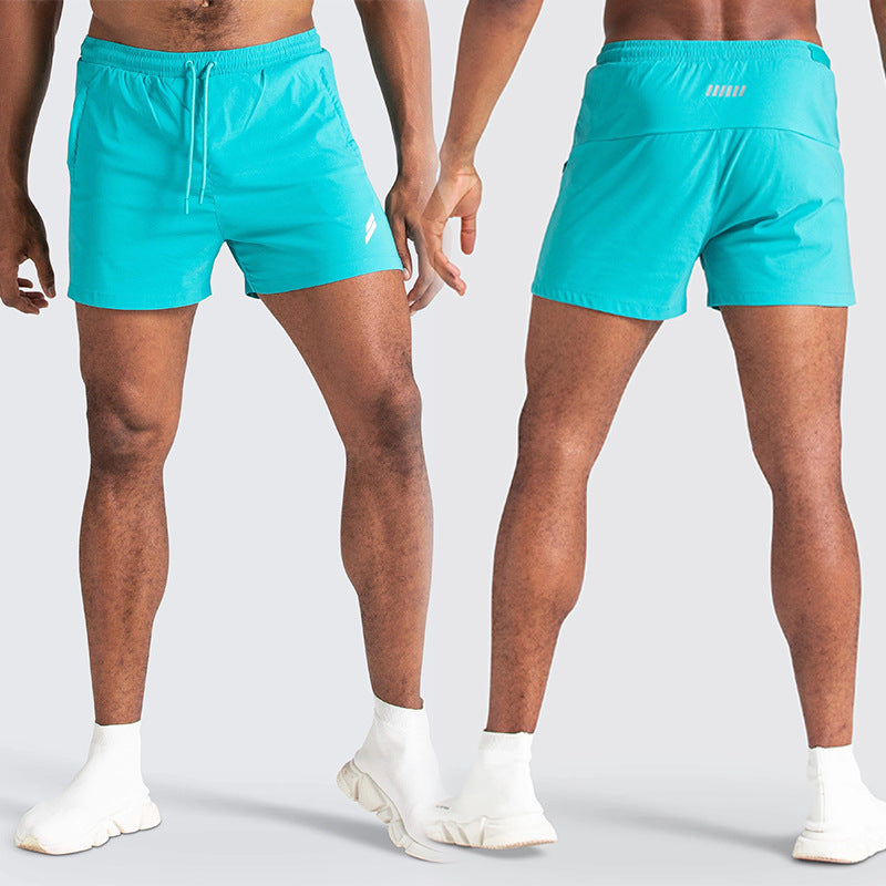 Men wearing  sky blue color ATHX New Running Shorts a product from mensathletix the best Men athletic shorts Gym shorts Mens running shorts Crossfit shorts Sports shorts sports shorts for men gym shorts