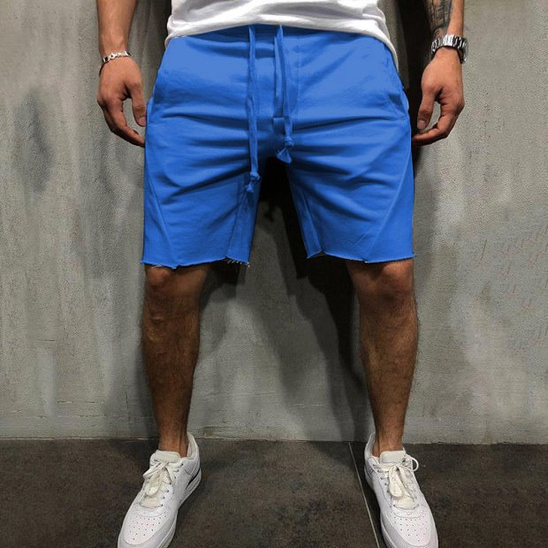 A man wearing blue color ActiveFlex Summer Gym Shorts a product from mensathletix the best Men athletic shorts Gym shorts Mens running shorts Crossfit shorts Sports shorts sports shorts for men Men gym shorts