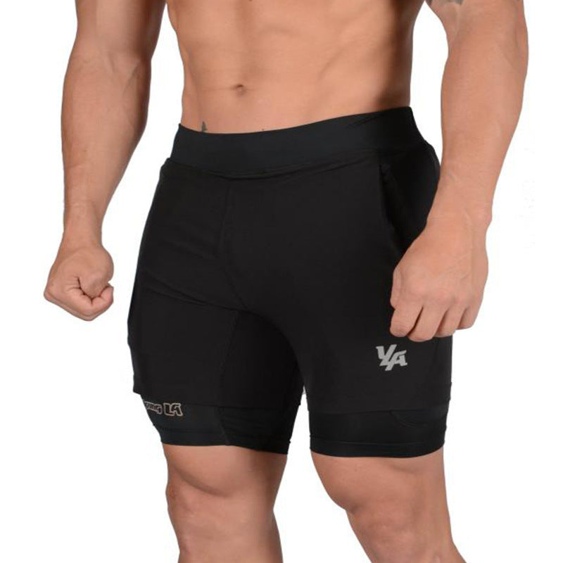 A man wearing black color ATHX 2-in-1 Gym Run Shorts a product from mensathletix the best Men athletic shorts Gym shorts Mens running shorts Crossfit shorts Sports shorts sports shorts for men Men gym shorts