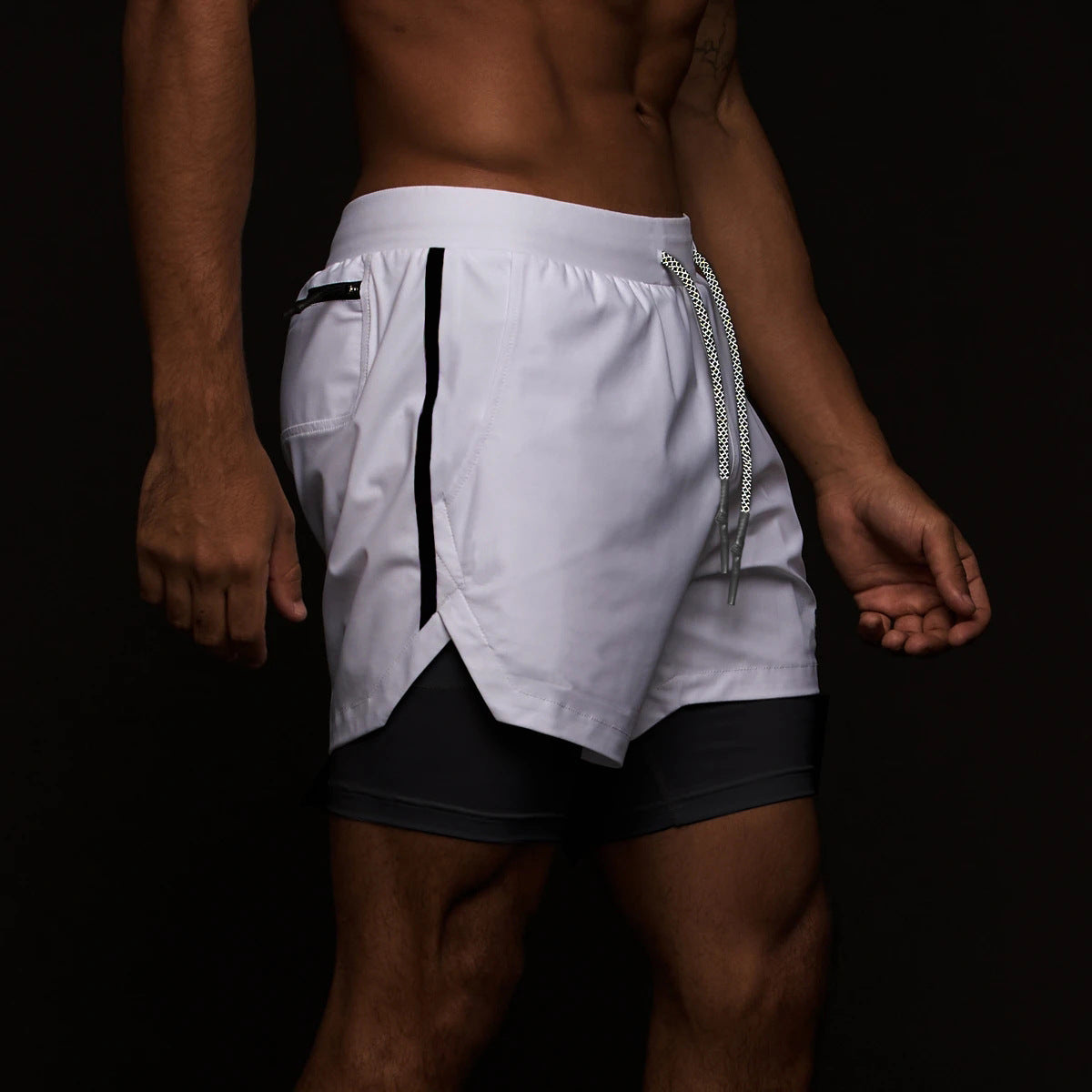 A man wearing white with black color ATHX FashionSport Double-Layer Shorts a product from mensathletix the best Men athletic shorts Gym shorts Mens running shorts Crossfit shorts Sports shorts sports shorts for Men gym shorts