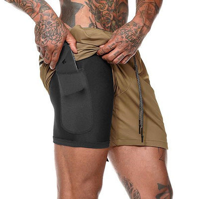 A man wearing brown with black color ATHX ForceFit Performance Short a product from mensathletix the best Men athletic shorts Gym shorts Mens running shorts Crossfit shorts Sports shorts sports shorts for Men gym shorts