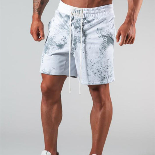 A man wearing white color ATHX MeshFit Training Shorts a product from mensathletix the best Men athletic shorts Gym shorts Mens running shorts Crossfit shorts Sports shorts sports shorts for men gym shorts