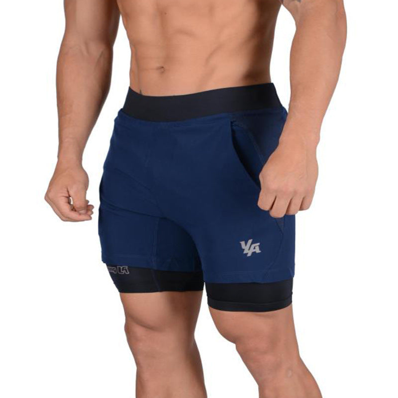 A man wearing navy blue color ATHX 2-in-1 Gym Run Shorts a product from mensathletix the best Men athletic shorts Gym shorts Mens running shorts Crossfit shorts Sports shorts sports shorts for men Men gym shorts