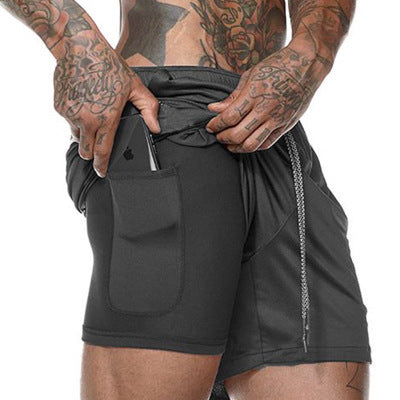 A man wearing black color ATHX ForceFit Performance Short a product from mensathletix the best Men athletic shorts Gym shorts Mens running shorts Crossfit shorts Sports shorts v gym shorts