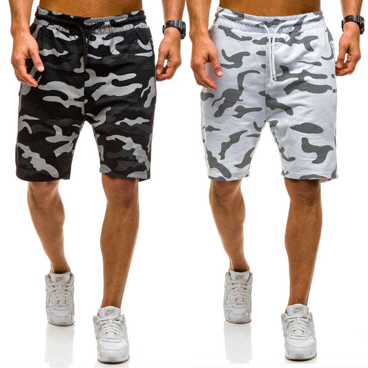 A man wearing camou color Camouflage lace-up shorts five minutes pants a product from mensathletix the best Men athletic shorts Gym shorts Mens running shorts Crossfit shorts Sports shorts sports shorts for men gym shorts