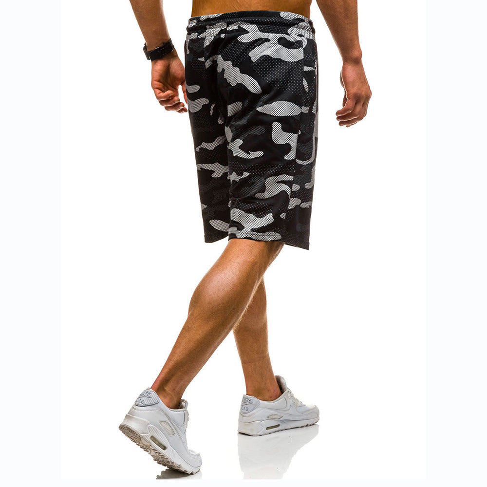 A man wearing camou color Camouflage lace-up shorts five minutes pants a product from mensathletix the best Men athletic shorts Gym shorts Mens running shorts Crossfit shorts Sports shorts sports shorts for men gym shorts