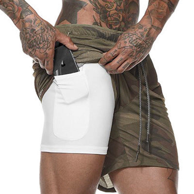 A man wearing camou with white color ATHX ForceFit Performance Short a product from mensathletix the best Men athletic shorts Gym shorts Mens running shorts Crossfit shorts Sports shorts sports shorts for Men gym shorts