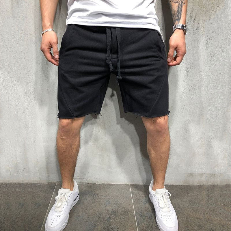 A man wearing a black color ActiveFlex Summer Gym Shorts  a product from mensathletix the best Men athletic shorts Gym shorts Mens running shorts Crossfit shorts Sports shorts sports shorts for men Men gym shorts