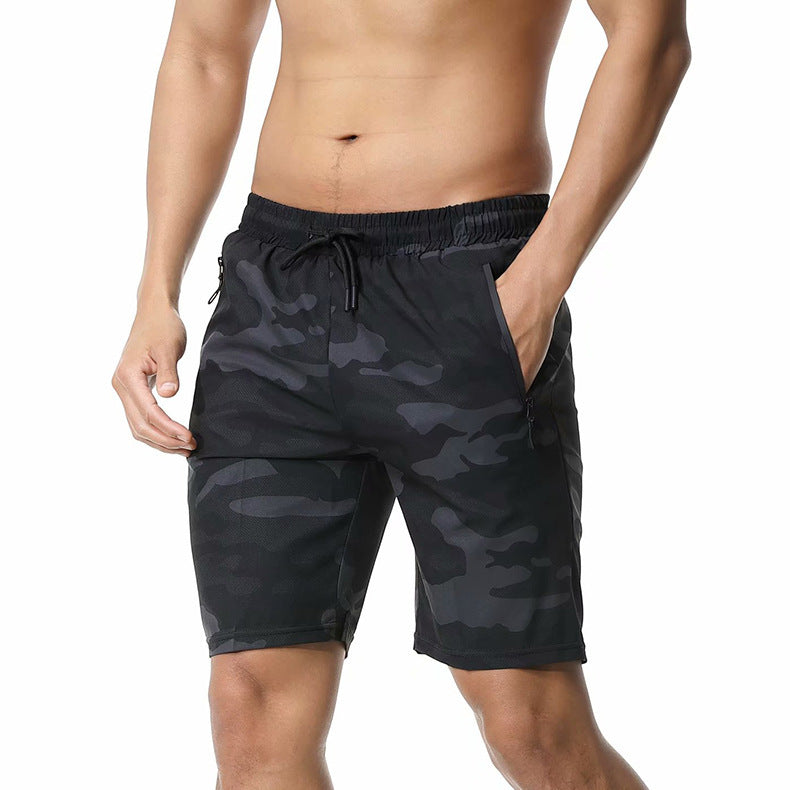 A man wearing black camou color ATHX CamoQuick Run Shorts a product from mensathletix the best Men athletic shorts Gym shorts Mens running shorts Crossfit shorts Sports shorts sports shorts for Men gym shorts