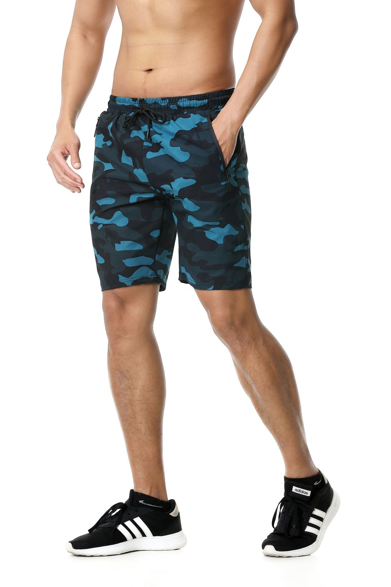 A man wearing blue camou color ATHX CamoQuick Run Shorts a product from mensathletix the best Men athletic shorts Gym shorts Mens running shorts Crossfit shorts Sports shorts sports shorts for Men gym shorts