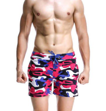 A man wearing red camou color ATHX Camo Cotton Shorts a product from mensathletix the best Men athletic shorts Gym shorts Mens running shorts Crossfit shorts Sports shorts sports shorts for men gym shorts