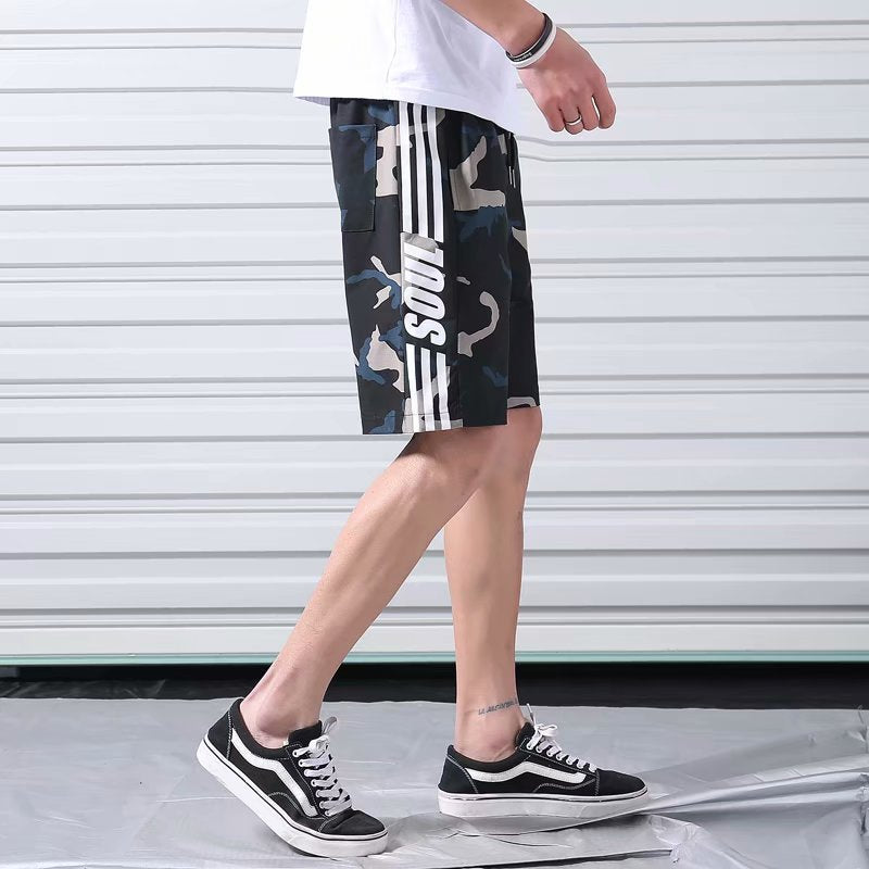 A man wearing camou color ATHX Camo Casual Shorts a product from mensathletix the best Men athletic shorts Gym shorts Mens running shorts Crossfit shorts Sports shorts sports shorts for men gym shorts