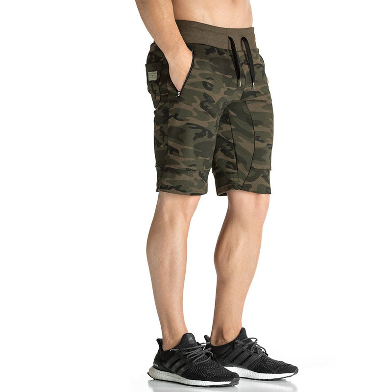 A man wearing camou color ATHX CamoFlex Outdoor Shorts a product from mensathletix the best Men athletic shorts Gym shorts Mens running shorts Crossfit shorts Sports shorts sports shorts for Men gym shorts