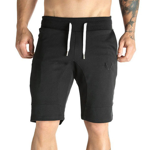 A man wearing black color ATHX CamoFlex Outdoor Shorts a product from mensathletix the best Men athletic shorts Gym shorts Mens running shorts Crossfit shorts Sports shorts sports shorts for Men gym shorts