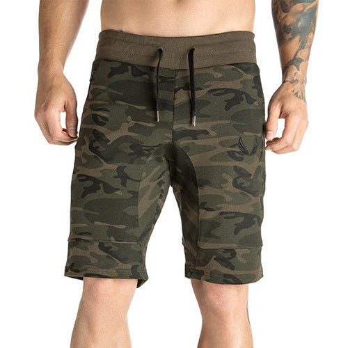 A man wearing camou color ATHX CamoFlex Outdoor Shorts a product from mensathletix the best Men athletic shorts Gym shorts Mens running shorts Crossfit shorts Sports shorts Vouri shorts Men gym shorts