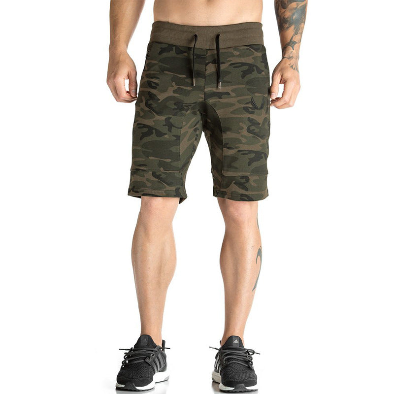 A man wearing camou color ATHX CamoFlex Outdoor Shorts a product from mensathletix the best Men athletic shorts Gym shorts Mens running shorts Crossfit shorts Sports shorts sports shorts for Men gym shorts