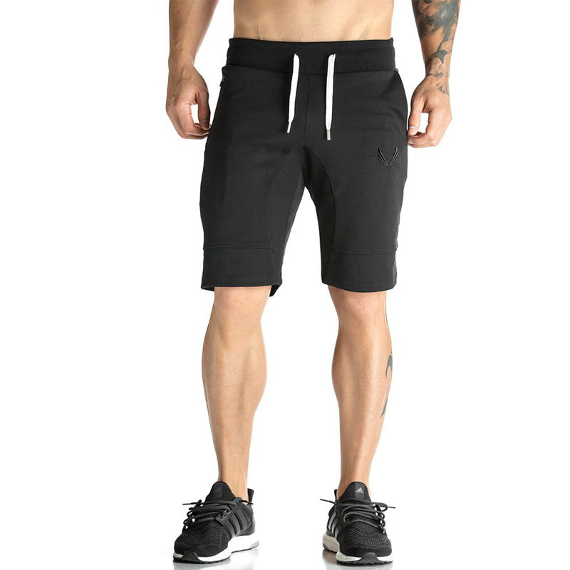 A man wearing black color ATHX CamoFlex Outdoor Shorts a product from mensathletix the best Men athletic shorts Gym shorts Mens running shorts Crossfit shorts Sports shorts sports shorts for Men gym shorts