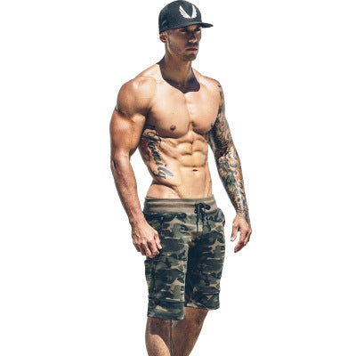 A man wearing camou color ATHX CamoFlex Outdoor Shorts a product from mensathletix the best Men athletic shorts Gym shorts Mens running shorts Crossfit shorts Sports shorts sports shorts for Men gym shorts