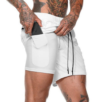 A man wearing white color ATHX ForceFit Performance Short a product from mensathletix the best Men athletic shorts Gym shorts Mens running shorts Crossfit shorts Sports shorts sports shorts for Men gym shorts