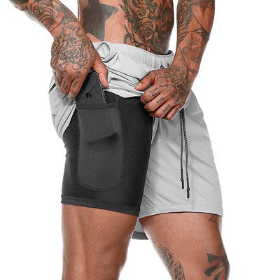 A man wearing white with color ATHX ForceFit Performance Short a product from mensathletix the best Men athletic shorts Gym shorts Mens running shorts Crossfit shorts Sports shorts sports shorts for Men gym shorts