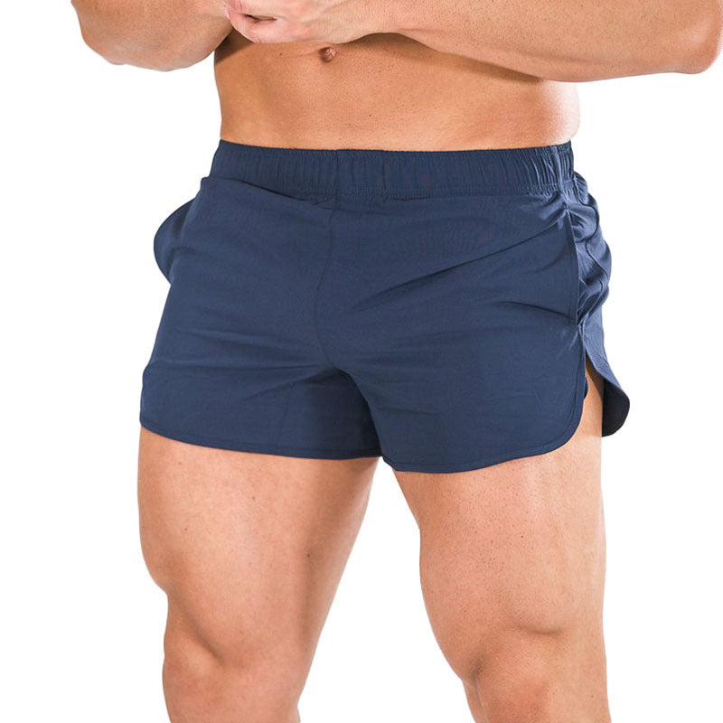 A man wearing blue color Fitness Basketball Shorts Men's Running Quick Dry Training Pants a product from mensathletix the best Men athletic shorts Gym shorts Mens running shorts Crossfit shorts Sports shorts Vouri shorts Men gym shorts