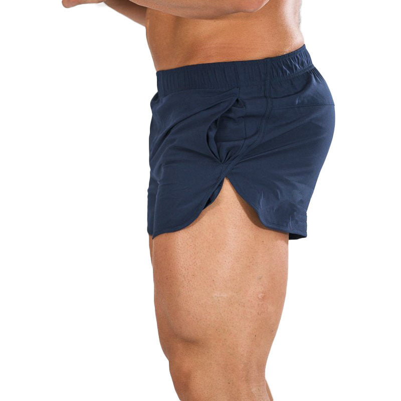 A man wearing blue color Fitness Basketball Shorts Men's Running Quick Dry Training Pants a product from mensathletix the best Men athletic shorts Gym shorts Mens running shorts Crossfit shorts Sports shorts Vouri shorts Men gym shorts